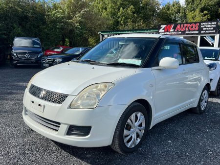 2010 Suzuki Swift - photo 2