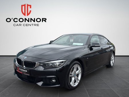 2018 BMW 4-Series All black, all business. until you put your foot down.