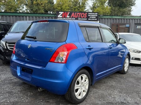 2011 Suzuki Swift - photo 7