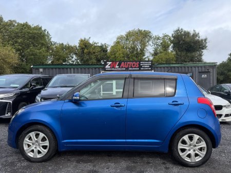 2011 Suzuki Swift - photo 4