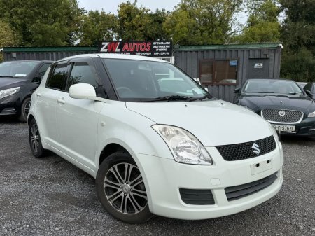 2010 Suzuki Swift - photo 2