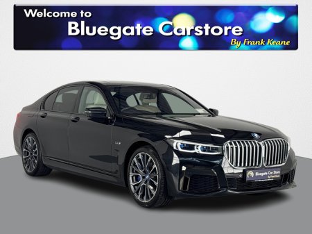 2022 BMW 7 Series 745E E LCI**PANORAMIC SUNROOF**HEATED MULTIFUNCTIONAL STEERING WHEEL**FRONT HEATED ELECTRIC SEATS**REAR HEATED SEATS**SOFT CLOSING DOORS**HARMON KARDON**APPLE CARPLAY**ELECTRIC TAILGATE**