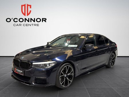 2018 BMW 5 Series “Carbon Black 530e – saves fuel, not attention.”