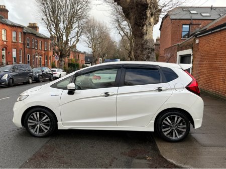 2014 Honda Fit 1.5 Hybrid Automatic, Only 133kms! New Nct 02/2027, Reversing Camera, Bluetooth, Sat Nav, Immaculate Condition, Cheap Tax @ €170, A/C, Alloys, Service & Warranty Included, SIMI Dealer, €8,950 thumbnail