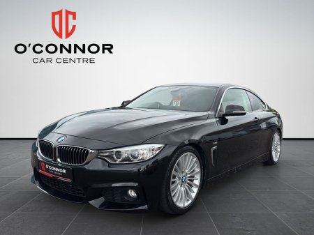 2017 BMW 4-Series Black outside, tan inside. classy from every angle